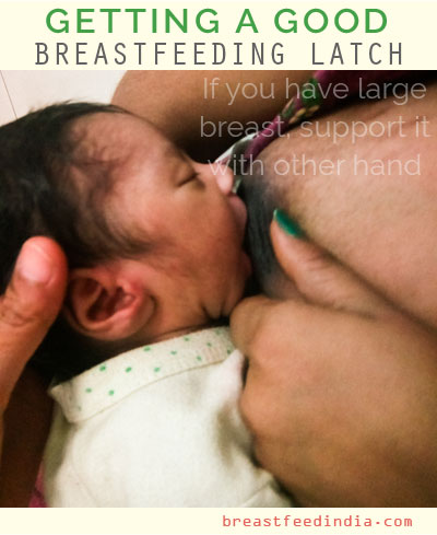 Support the breasts while breastfeeding